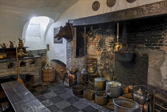 Kasteel van Laarne, interior showing kitchen and open fireplace inside 14th century medieval moated