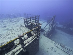 Deck and steel stairs of an abandoned shipwreck under water, dive site wreck of the USS Spiegel