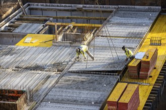 Construction site, installation of semi-precast floor slabs, which are then filled with in-situ