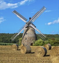 Historic windmill with straw bales Eisbergen Porta Westfalica Germany