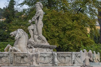 Detailed view of the Neptune Fountain around 1900, in the garden of the Villa del Principe, behind