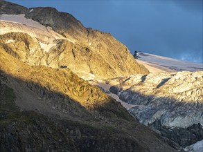 Mountain hut Cabane de Moiry at sunset, Moiry glacier, Valais, Switzerland, Europe