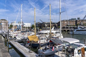 Rotterdam Marina, behind high-rise buildings in the Maritiem District on the other side of the