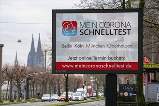 LED billboard, with digital advertising for Corona rapid tests, in the test centre in Cologne, on