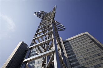 Sculpture by Nicolas Schöffer entitled Chronos 15, light-kinetic tower in front of the Stadthaus,