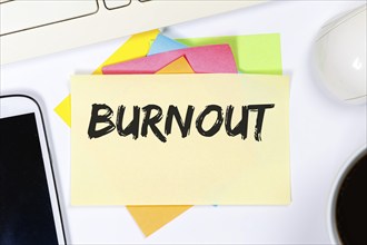 Burnout syndrome sickness stress at work business concept on desk in