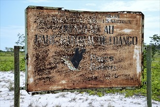 Rusted sign at the entrance to Loango National Park, Parc National de Loango, Ogooué-Maritime