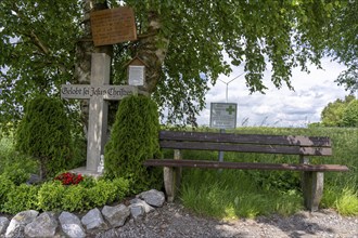 Wind farm north of Marsberg, wayside cross, park bench and emergency sign, rescue point,