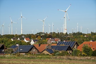 Wind farm above the village of Lichtenau, self-proclaimed energy town, houses with photovoltaic