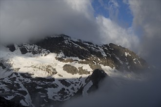 Cloudy mountain landscape, Griesferner summit with glacier, Berliner Höhenweg, Zillertal, Tyrol,