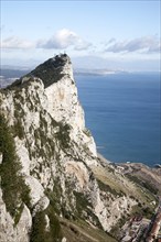 Sheer white rock mountainside the Rock of Gibraltar, British territory in southern Europe