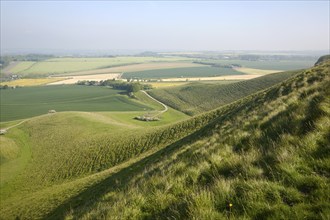 Summer view arable fields chalk landscape from Cherhill Down escarpment, Wiltshire, England, UK