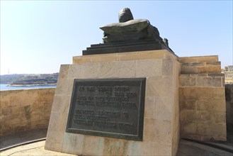 Recumbent figure sculpture by Michael Sandle memorial for 1940-1943 siege, Grand Harbour, Valletta,