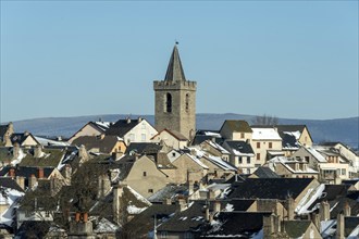 Dungeon Tower of Saint Chely d'Apcher in winter, Margeride, Lozere department, Occitanie, France,