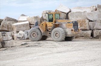 Heavy machinery in a working quarry, Isle of Portland, Dorset, England, United Kingdom, Europe