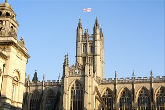 English flag flying on the tower of the Abbey church, Bath, Somerset, England, United Kingdom,