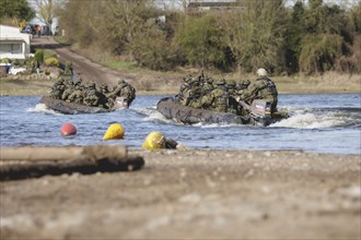 Czech soldiers cross the Elbe in an inflatable boat as part of the military exercise 'Wettiner