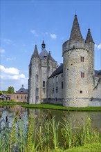 Round tower and keep of the Kasteel van Laarne, 14th century medieval moated castle near Ghent,