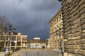 Rainy weather in Dresden's old town. A faint rainbow at the Semper Opera House, Dresden, Saxony,