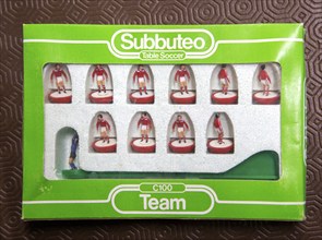 Boxed set of Subbuteo table soccer team C100 players close up, UK