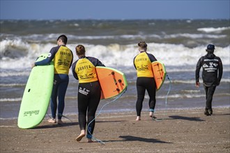 Course for surfers, surfing beginners, on the beach of Scheveningen, Netherlands