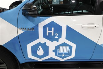 H2 hydrogen fuel cell logo on a Toyoa Hilux Fuel Cell Electric Vehicle at the IAA Transportation