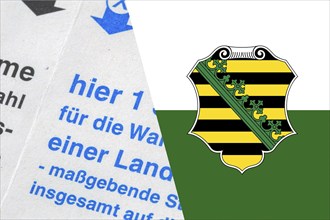 Symbolic image of state election in Saxony: Flag of Saxony and close-up of a ballot paper. The next