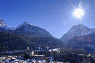 Scuol in winter, with Piz Lischana and Piz San Jon, Engadin, Grisons, Switzerland, Europe