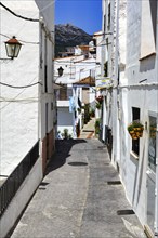 Typical white village Casares, houses, narrow alley on a hill, Route of the white villages, Malaga,