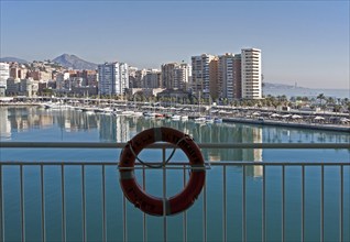 Apartment blocks and yachts in marina of Muelle Uno port development, city of Malaga, Spain, Europe