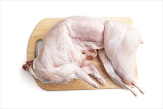 Whole raw rabbit isolated on a white background. Top view, flat lay, close up