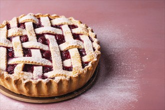 Linzertorte tart on pink background. KI generiert, generiert AI generated