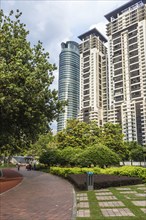 Modern building with a small garden and a brick walkway in Kuala Lumpur, Malaysia, Asia