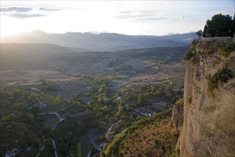 View over countryside and mountains at dusk from Ronda, Spain, Europe