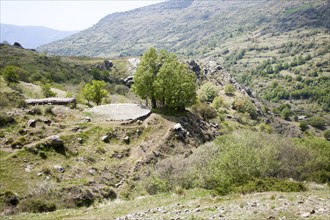 Landscape of the River Rio Poqueira gorge valley, High Alpujarras, Sierra Nevada, Granada Province,