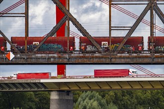 The Beeckerwerth Rhine bridge of the A42 motorway, truck traffic, in front of it the Haus-Knipp