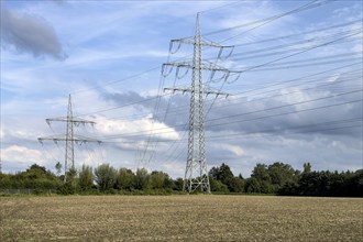 Two overhead line pylons High-voltage pylons Power pylons Support electricity pylon Suspension of