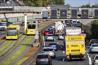 Traffic jam on the A40 motorway, Ruhr expressway, bus lane in the middle of the carriageway, public