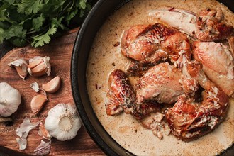 Shkmeruli, fried chicken, in milk-garlic sauce, Georgian cuisine, homemade, close-up, no people