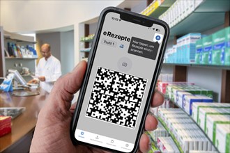 Symbolic image of an e-prescription, prescription issued by a doctor, with QR code, is scanned