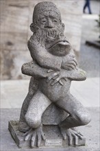 Frog rider, stone sculpture on the Old Main Bridge by sculptor Richard Rother, Kitzingen, Lower