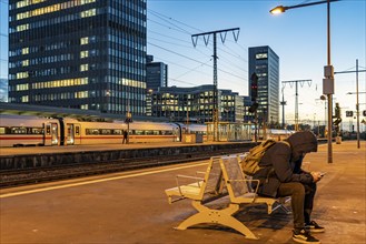 Railway station, ICE train on platform, skyline of Essen city centre, North Rhine-Westphalia,