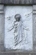 Natural stone relief with Christ figure in a cemetery, stonemasonry, artwork, Bavaria, Germany,