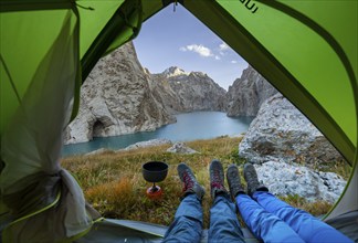 Wild camping, camping in the wilderness with a tent, Kol Suu mountain lake, Sary Beles Mountains,