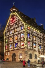 Pilatushaus, built in 1489, a historic town house with an Advent calendar on 18 December 2024 at