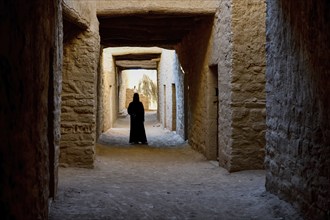 Local Veiled Woman in the Old City of AlUla, Medina Province, Saudi Arabia, Arabian Peninsula, Asia