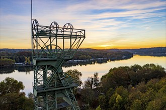 Sunset at Lake Baldeney in Essen, reservoir of the Ruhr, headframe of the former Carl Funke