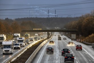 Motorway A3 between Opladen and Leverkusen, rainy weather, autumn, heavy traffic, in the background