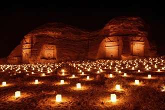 Illuminated Nabataean tombs at night, Hegra or Mada'in Salih, AlUla region, Medina province, Saudi