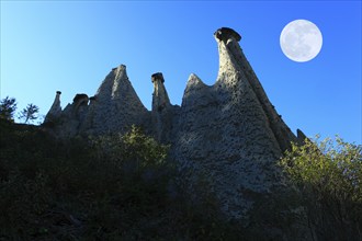 Earth pyramids of Euseigne, Val d'Herens, full moon, d'Heremence, Valais, Switzerland, Europe